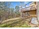 Picturesque backyard featuring a large wooden deck and ample space for recreation at 1039 Ashfern Walk, Woodstock, GA 30189