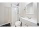 Bathroom featuring a glass shower stall, modern vanity, and updated plumbing fixtures at 1039 Ashfern Walk, Woodstock, GA 30189
