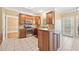 Modern kitchen with stainless steel appliances, an island, and ample storage at 1039 Ashfern Walk, Woodstock, GA 30189