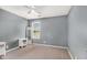 Simple bedroom with neutral walls, a window, and a carpeted floor, ready for personal touches at 340 Nail Rd, Mcdonough, GA 30253