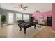 Spacious game room featuring a pool table, foosball, and classic arcade machines at 340 Nail Rd, Mcdonough, GA 30253