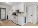 Functional kitchen design with all white cabinets, countertops and appliances at 340 Nail Rd, Mcdonough, GA 30253