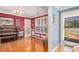 Charming music room featuring hardwood floors, piano, and bright colors, filled with natural light at 340 Nail Rd, Mcdonough, GA 30253