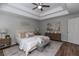 Beautiful bedroom with tray ceilings and neutral paint at 3894 Dunaire Dr, Stone Mountain, GA 30083