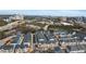 Aerial view of new homes in a community with a city skyline in the distance at 4100 Paces Se Walk # 2205, Atlanta, GA 30339