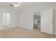 Bright bedroom featuring carpet flooring, closet space, and bathroom entrance at 4100 Paces Se Walk # 2205, Atlanta, GA 30339
