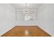 Dining room with hardwood floors, mirror and chandelier at 4100 Paces Se Walk # 2205, Atlanta, GA 30339