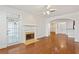 Living room with an archway, fireplace, and an entrance to the outside porch at 4100 Paces Se Walk # 2205, Atlanta, GA 30339