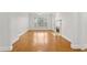 Bright living room featuring hardwood floors, fireplace, and large windows at 4100 Paces Se Walk # 2205, Atlanta, GA 30339