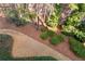 Gravel path winding through trees and shrubbery at 4100 Paces Se Walk # 2205, Atlanta, GA 30339