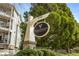 Vinings Vineyard Condominiums community sign with lush greenery at 4100 Paces Se Walk # 2205, Atlanta, GA 30339