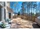 Large back deck with comfortable seating and grill offering scenic outdoor enjoyment at 5383 Fawn Meadow Ln, Powder Springs, GA 30127