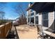 Expansive back deck with seating and a grill offers a great view, ideal for entertaining at 5383 Fawn Meadow Ln, Powder Springs, GA 30127