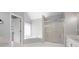 Bathroom with walk-in shower, soaking tub, and a modern vanity with lots of storage at 5383 Fawn Meadow Ln, Powder Springs, GA 30127