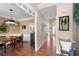 Elegant dining room featuring a hardwood floor and open entry to foyer and hall at 5383 Fawn Meadow Ln, Powder Springs, GA 30127