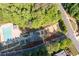 An aerial view shows the community playground with a pool and clubhouse, perfect for Gathering fun at 5383 Fawn Meadow Ln, Powder Springs, GA 30127