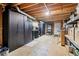 Unfinished basement providing functional space with ample storage solutions and workspace at 828 Guinevere Sw Way, Lilburn, GA 30047