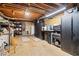 Unfinished basement offering flexible storage or workshop potential with exposed ceiling at 828 Guinevere Sw Way, Lilburn, GA 30047
