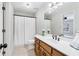Charming bathroom featuring a white vanity and shower with curtain at 828 Guinevere Sw Way, Lilburn, GA 30047