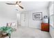 Bright bedroom with plush carpet, a picture window, and plenty of space at 828 Guinevere Sw Way, Lilburn, GA 30047