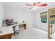 Bright bedroom featuring a desk and adjacent bunk beds, perfect for or guests at 828 Guinevere Sw Way, Lilburn, GA 30047
