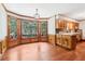 Cozy dining area featuring natural light and wood floors, perfect for Gathering gatherings at 828 Guinevere Sw Way, Lilburn, GA 30047