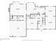 Floor plan for the first floor of the home with layout of the kitchen, dining room, living room, and garage at 828 Guinevere Sw Way, Lilburn, GA 30047