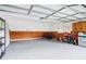 Spacious garage with clean epoxy flooring and ample room for parking and storage at 828 Guinevere Sw Way, Lilburn, GA 30047