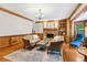 Inviting living room features a cozy fireplace, hardwood floors, and natural light at 828 Guinevere Sw Way, Lilburn, GA 30047