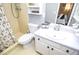 Well-lit bathroom featuring a shower-tub combination, a toilet, and a vanity with a sink at 1438 Ridgeland Sw Ct, Lilburn, GA 30047