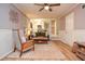 Cozy living room with natural light, stylish decor, hardwood floors, and an inviting atmosphere at 1438 Ridgeland Sw Ct, Lilburn, GA 30047