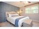 Bright bedroom showcasing stylish decor, natural light from the window, and a cozy, inviting feel at 1438 Ridgeland Sw Ct, Lilburn, GA 30047