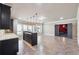 Spacious finished basement with wet bar and seating area, as well as access to a soundproof theater at 1655 Dawn Dr, Suwanee, GA 30024