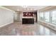 Finished basement with a bar area featuring a granite countertop and hanging pendant lighting fixtures at 1655 Dawn Dr, Suwanee, GA 30024