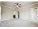 Bedroom with an ensuite bath, walk-in closet, and natural light at 1655 Dawn Dr, Suwanee, GA 30024