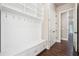 Well-organized mudroom with built-in storage and hooks at 1655 Dawn Dr, Suwanee, GA 30024