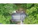 Aerial view of the house with a backyard deck, perfect for outdoor entertaining and relaxation at 5500 Georgetown Sw Trce, Lilburn, GA 30047