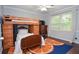Cozy bedroom featuring a unique bunk bed design, hardwood floors and a cozy atmosphere for restful nights at 5500 Georgetown Sw Trce, Lilburn, GA 30047