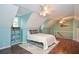 Bright bedroom with hardwood floors, a full bed, ample natural light and custom built-ins at 5500 Georgetown Sw Trce, Lilburn, GA 30047