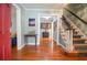 Elegant foyer with hardwood floors and a staircase at 5500 Georgetown Sw Trce, Lilburn, GA 30047
