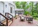 Cozy patio with a seating area and a screened-in porch, perfect for relaxation and entertaining at 5500 Georgetown Sw Trce, Lilburn, GA 30047
