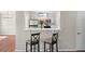 Charming kitchen with stainless steel appliances and breakfast bar at 303 Mill Pond Se Ct, Smyrna, GA 30082