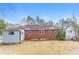 View of the backyard and rear exterior of the home at 3588 Swallow Ln, Decatur, GA 30032