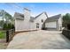 View of the backyard, featuring a fenced area, concrete patio, and privacy from mature trees at 111 Carter Ln, Canton, GA 30115