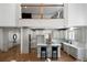 Overhead view of kitchen with ample counter space, stainless appliances and bar seating at 111 Carter Ln, Canton, GA 30115
