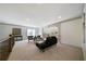 Cozy loft area with lounge furniture and soft carpeting at 111 Carter Ln, Canton, GA 30115