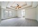 Expansive main bedroom with tray ceiling and large windows at 111 Carter Ln, Canton, GA 30115