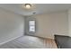 Neutral Bedroom with lots of natural light and plush neutral carpeting at 1915 Turtle Creek Way, Lawrenceville, GA 30043