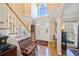 Inviting foyer with hardwood floors, staircase, and natural light at 918 Fox Hollow Way, Marietta, GA 30068