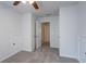 Bedroom featuring neutral walls, carpet, and multiple access doors at 966 Westmoreland Nw Cir, Atlanta, GA 30318